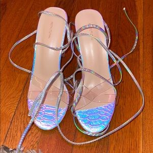 Holographic strap heels